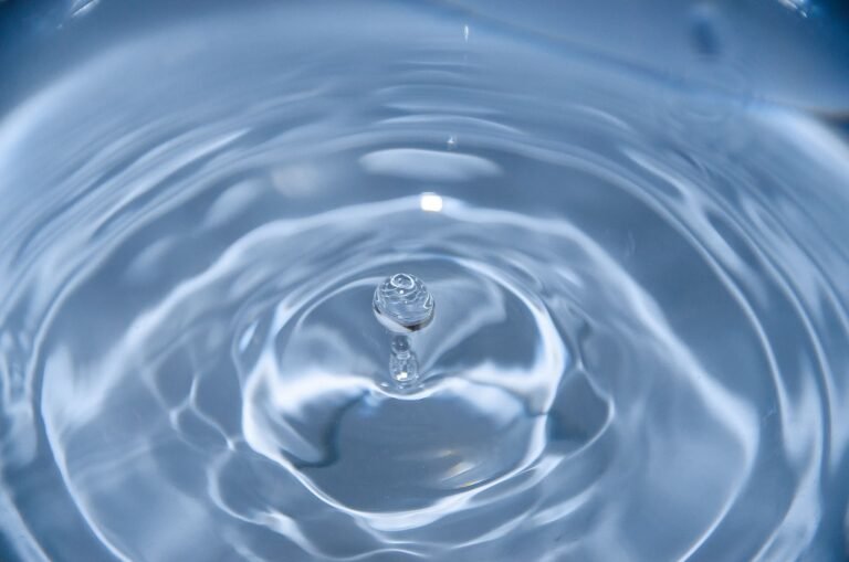 Water droplet rippling in cold water